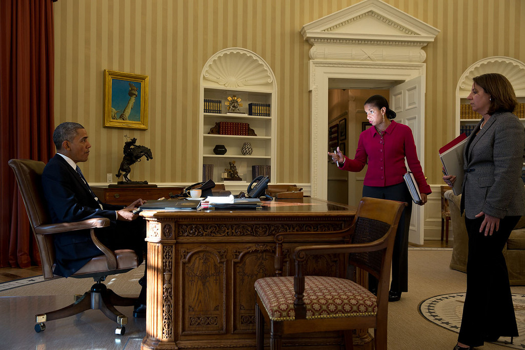 president obama sitting at his desk